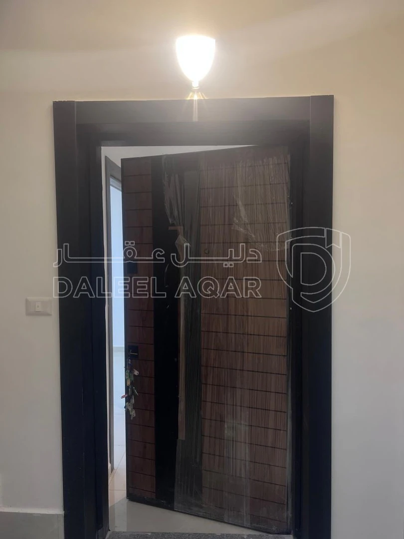 شقة في ابو نصير قرب مسجد الانصار - 68,000 دأ - صورة 1